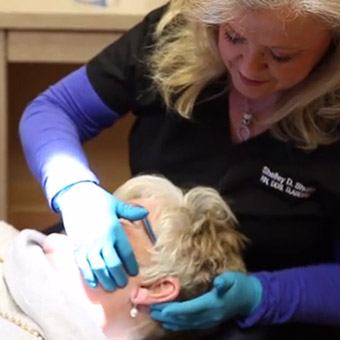 Dr. Shults treating patient