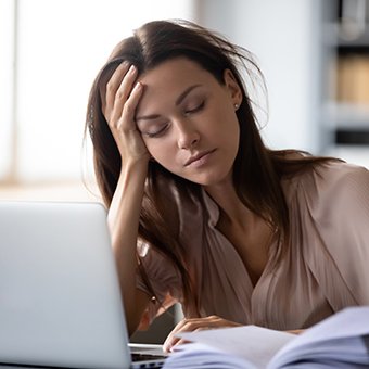 Woman experiencing chronic fatigue because of sleep apnea in Powell