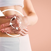Person holding their stomach