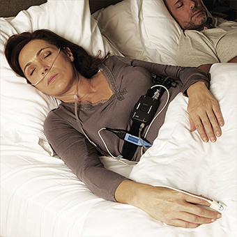 Woman receiving home sleep test