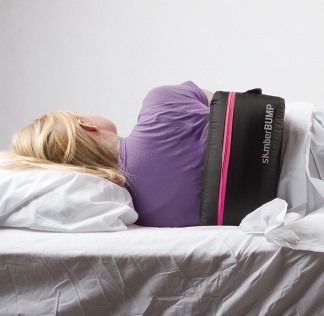 Woman sleeping with belt around back