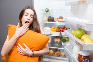 tired woman open refrigerator