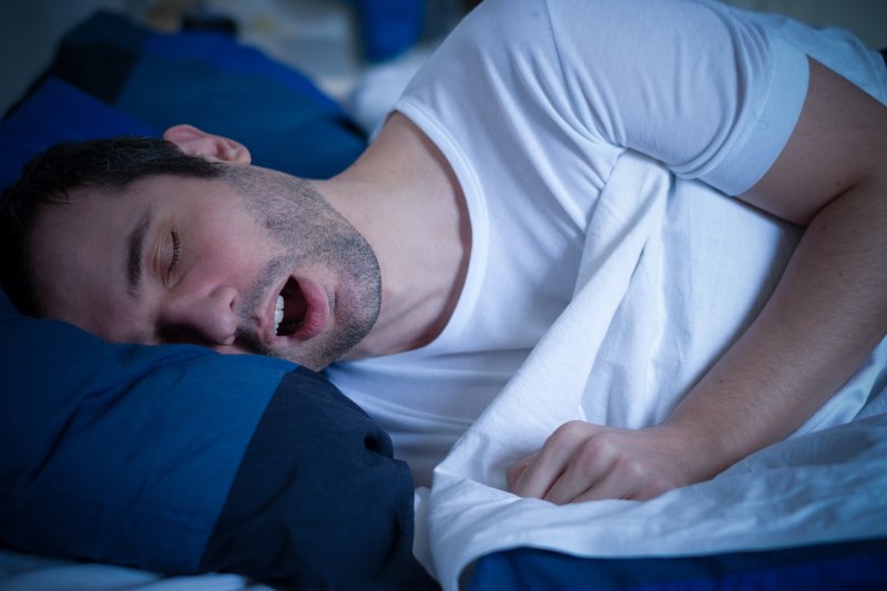 man asleep and breathing through his mouth
